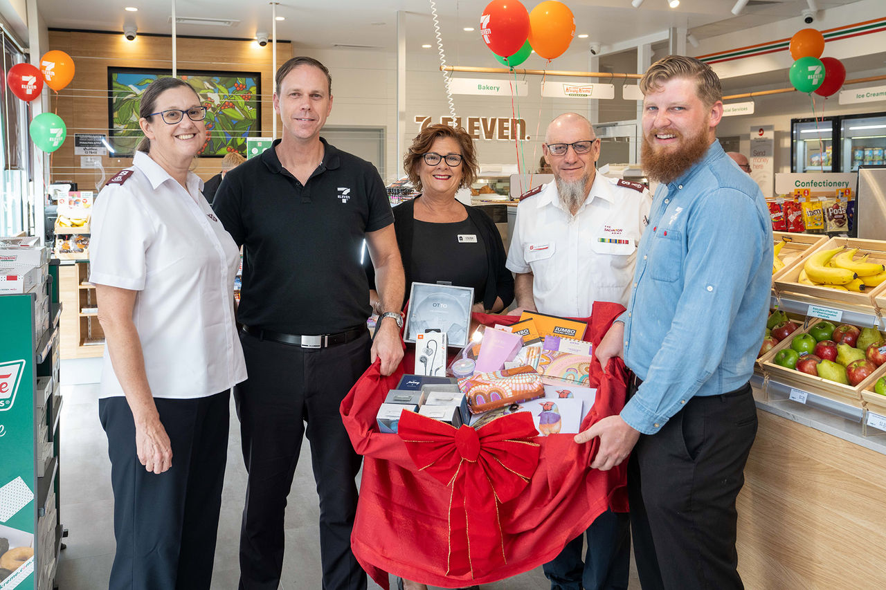 Team members from 7-Eleven donating gifts to The Salvation Army Townsville