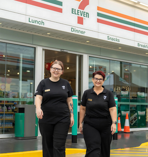 two 7-eleven staff members