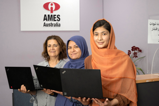 AMES students with donated laptops