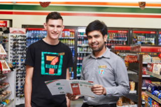 Two 7-Eleven team members in-store.