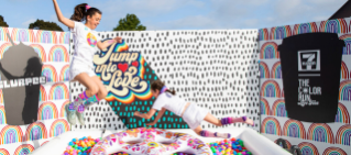 Two girls in a jumping castle at the Colour Run.