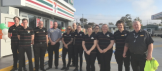 7-Eleven Westbrook team standing outside of the store.