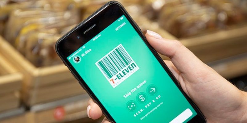 7-Eleven app on a phone. The phone is being held in someone's hand.