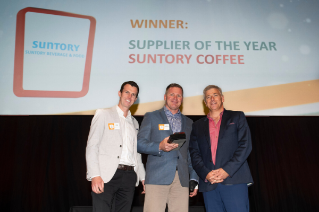 7-Eleven team winning an award for Supplier of the year.