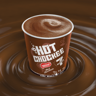 Cup of 7-Eleven Hot Chockee surrounded by melted chocolate.